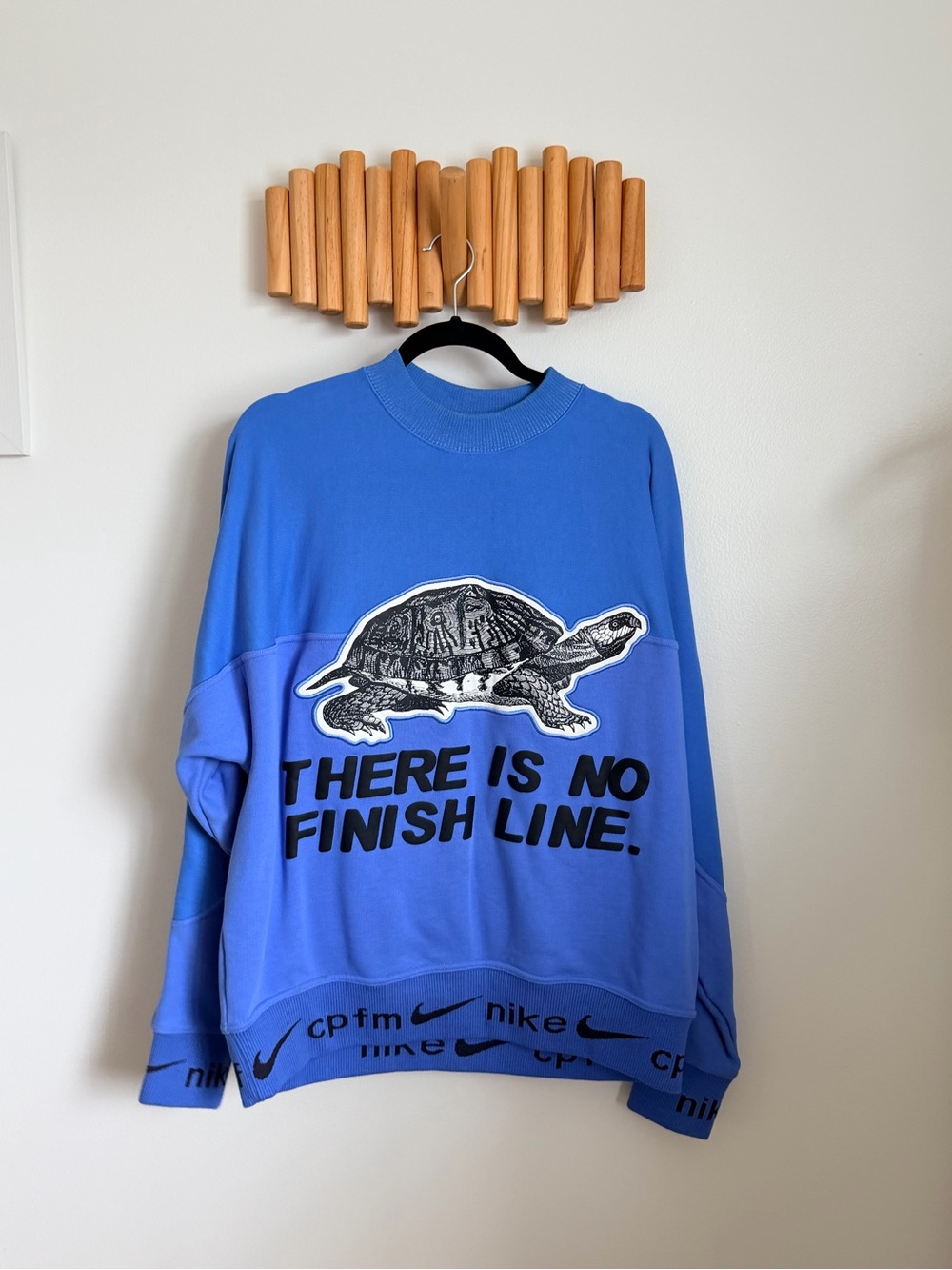 Nike Blue Graphic Crewneck Sweater - 'There Is No Finish Line'